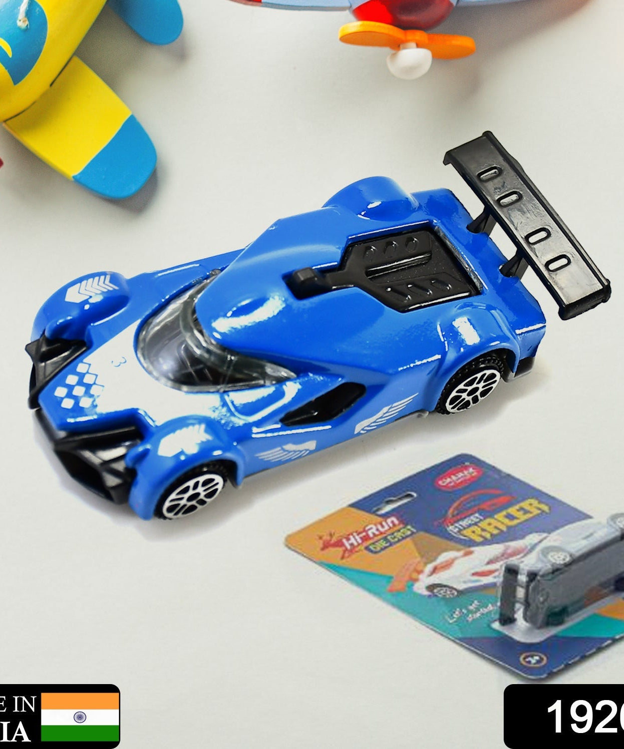 Die-cast metal race car toy, close-up, 3+ years