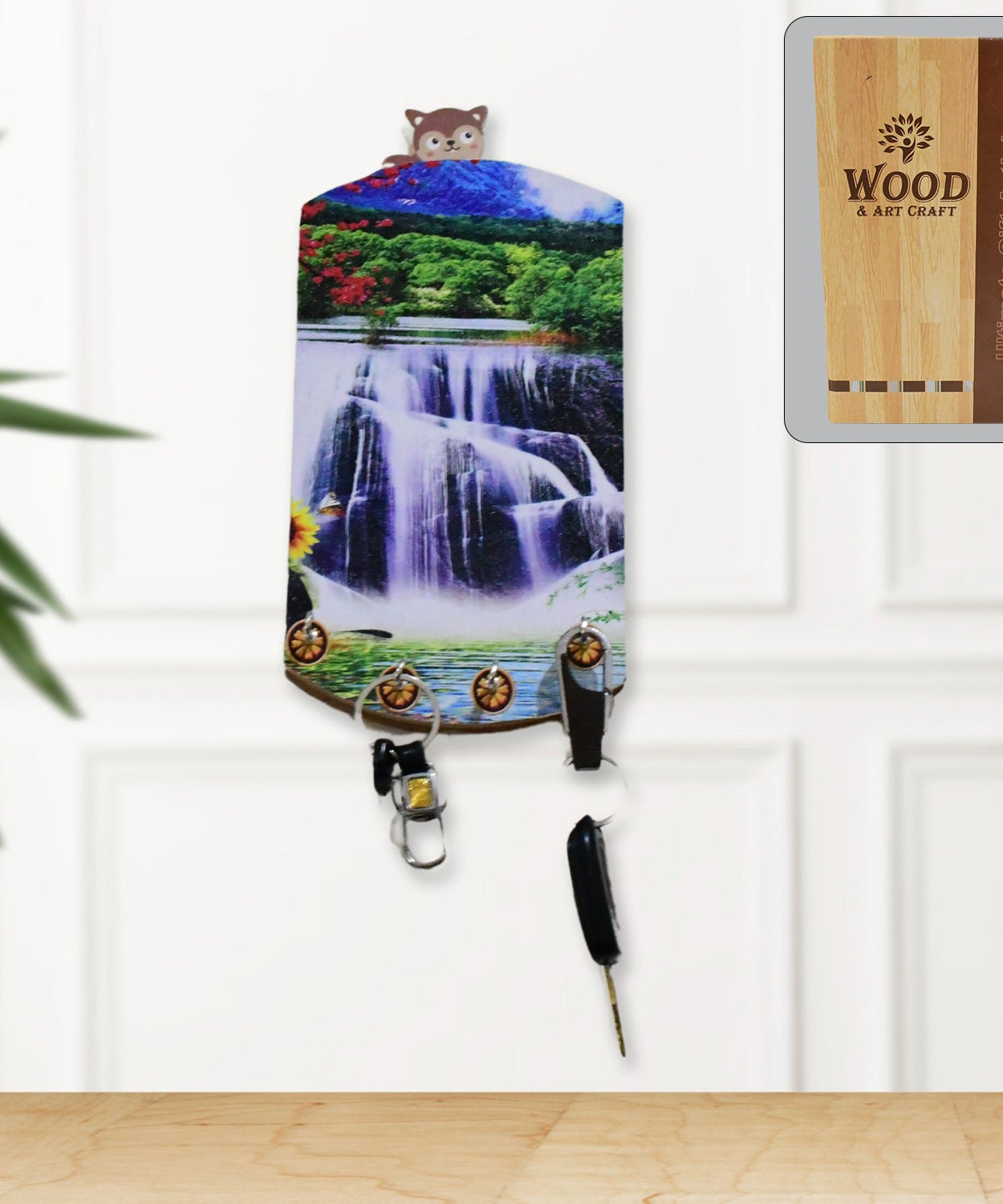 Wooden vertical scenery art with hooks for wall hanging.