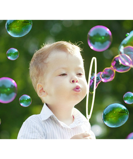 Bubble gun liquid refill bottle with a clear label showing liquid inside