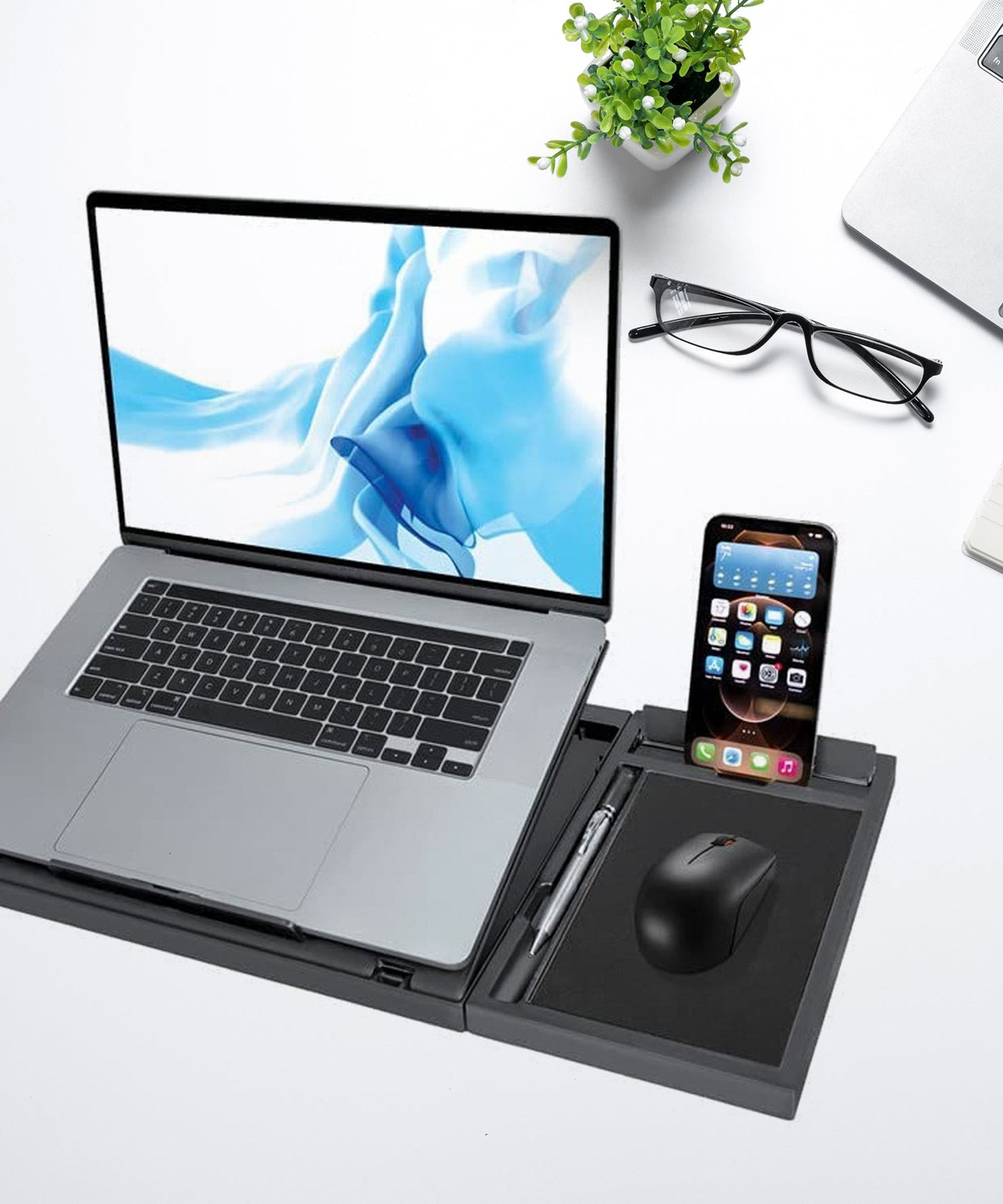 Portable foldable laptop stand with phone holder, compatible with MacBook and tablets.