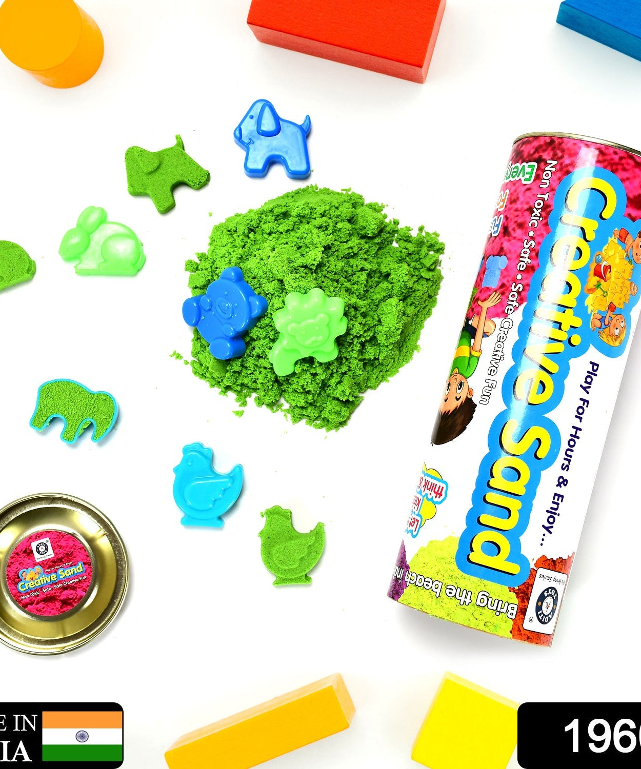 Hands playing with colorful kinetic sand.