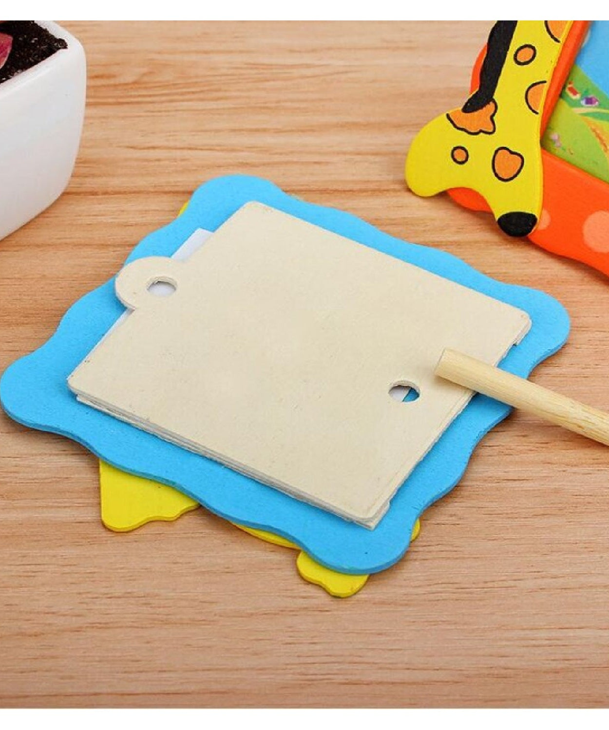 Decorative photo frame for table display, synthetic.