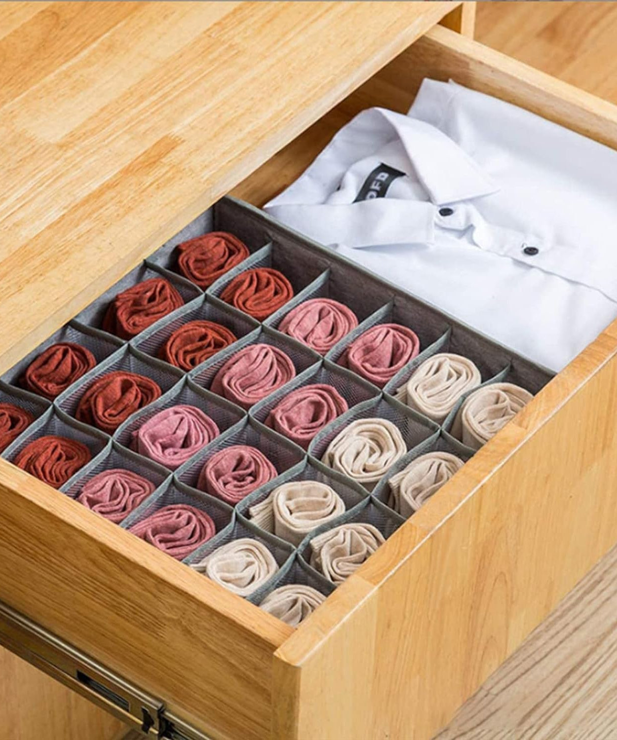 Foldable storage box for organizing ties and belts.