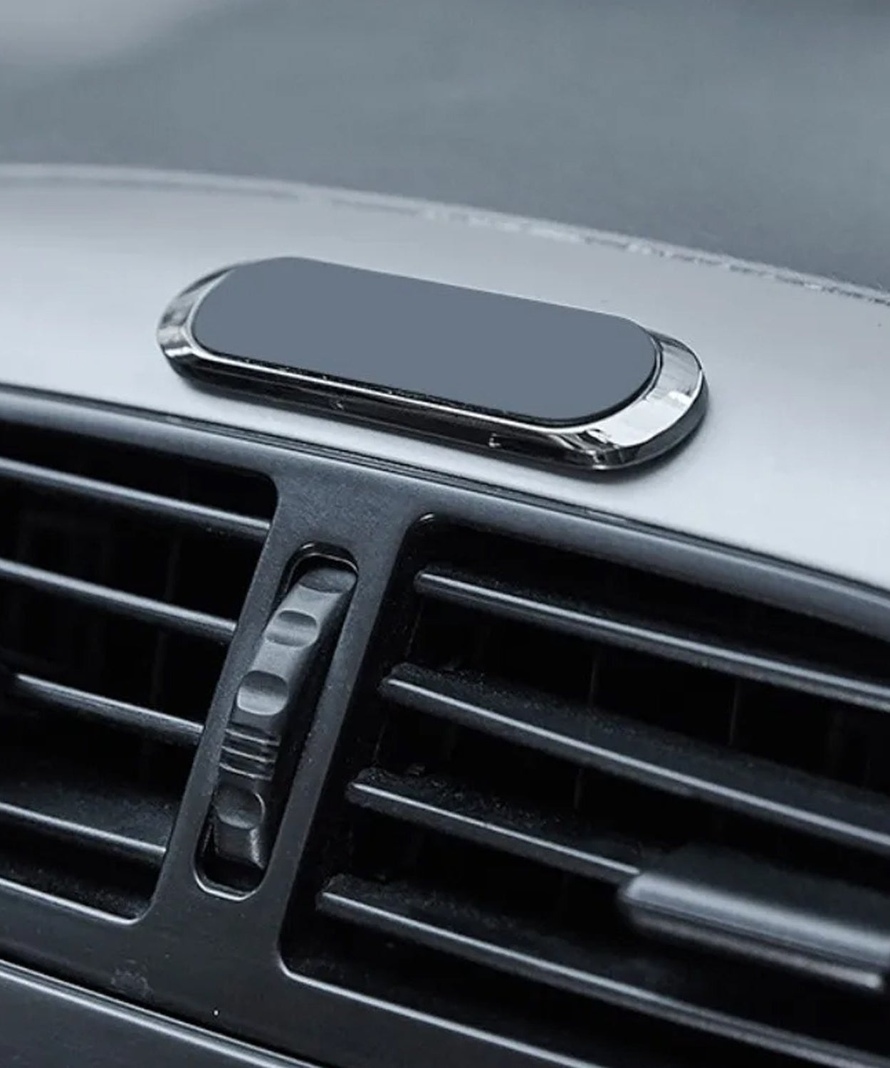Durable car dashboard phone holder with rotation feature.