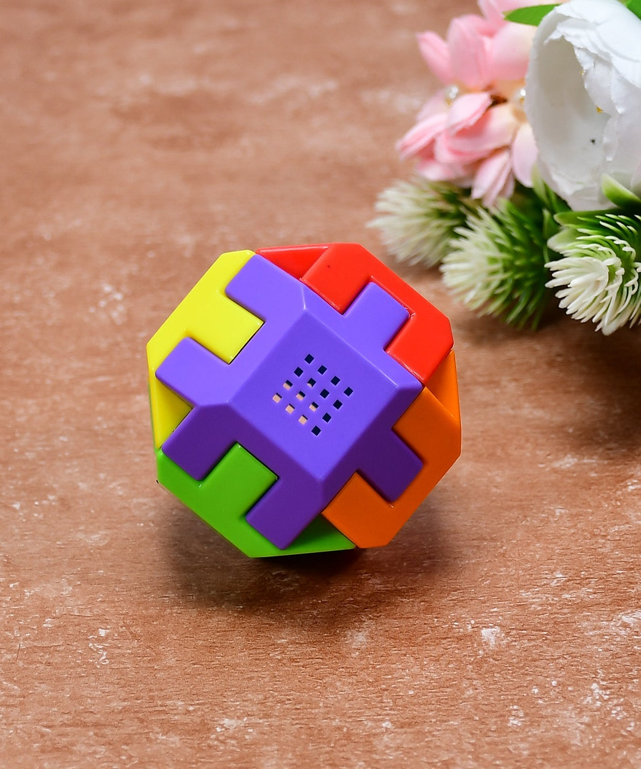 Multicolor Octa Cube activity toy.