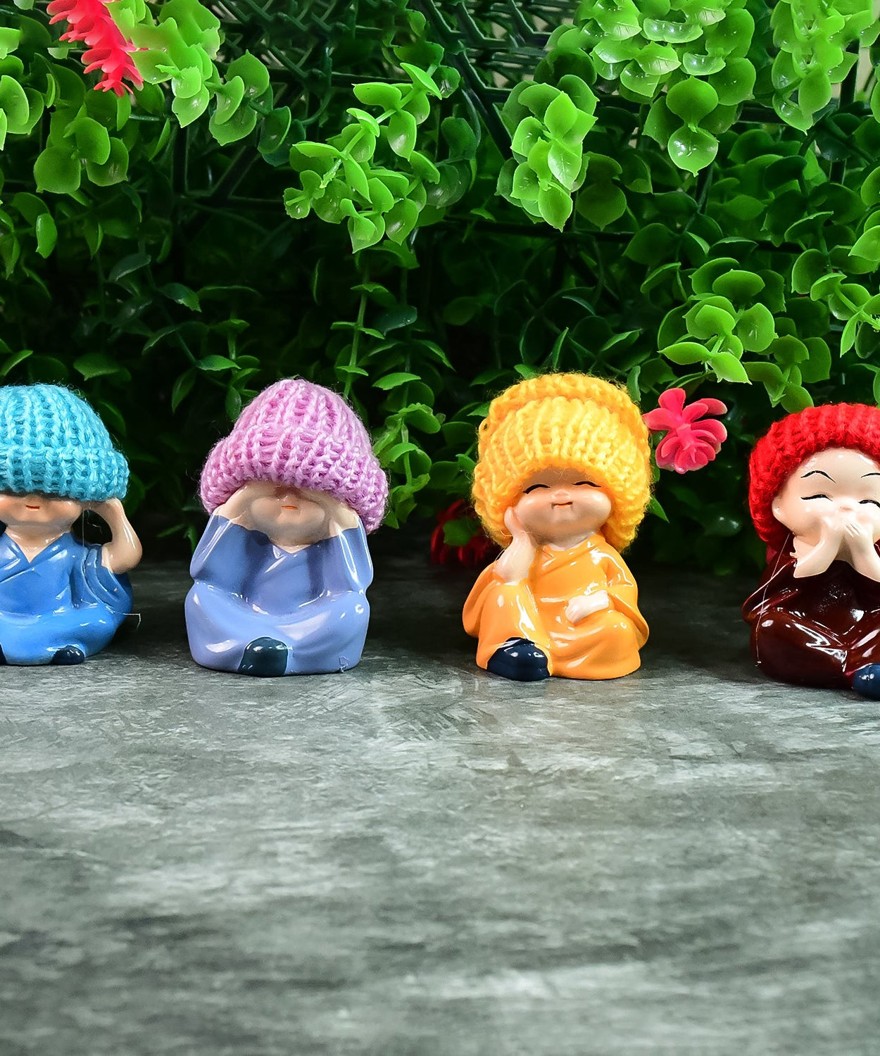 Decorative Resin Monk Buddha Showpiece Set of 4 with Traditional Straw Hats