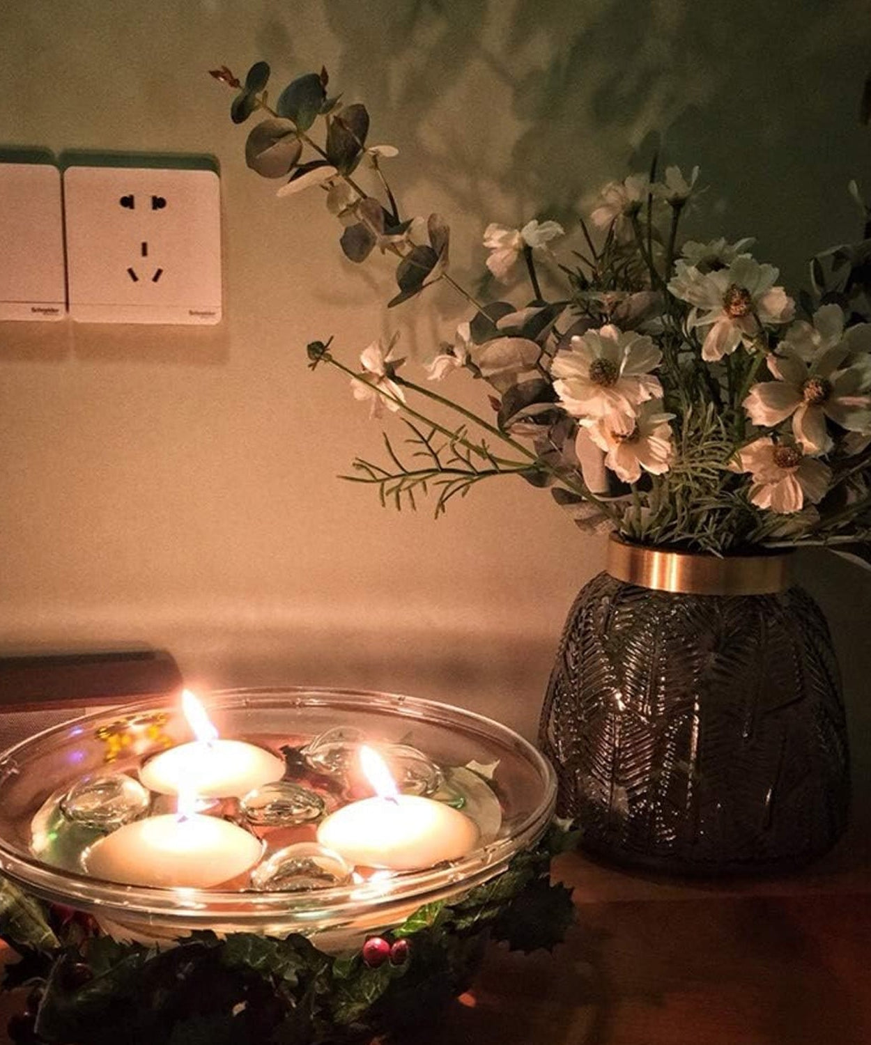 Stylish floating candle holder for table decoration.