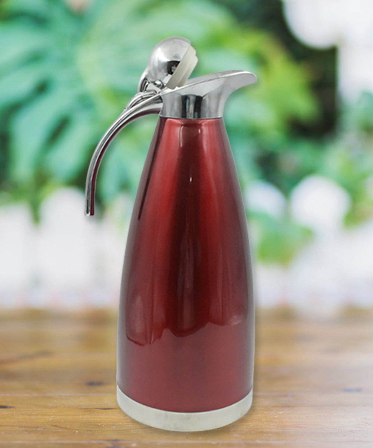 Stainless steel vacuum insulated kettle jug, 2L size, perfect for hot and cold beverages.