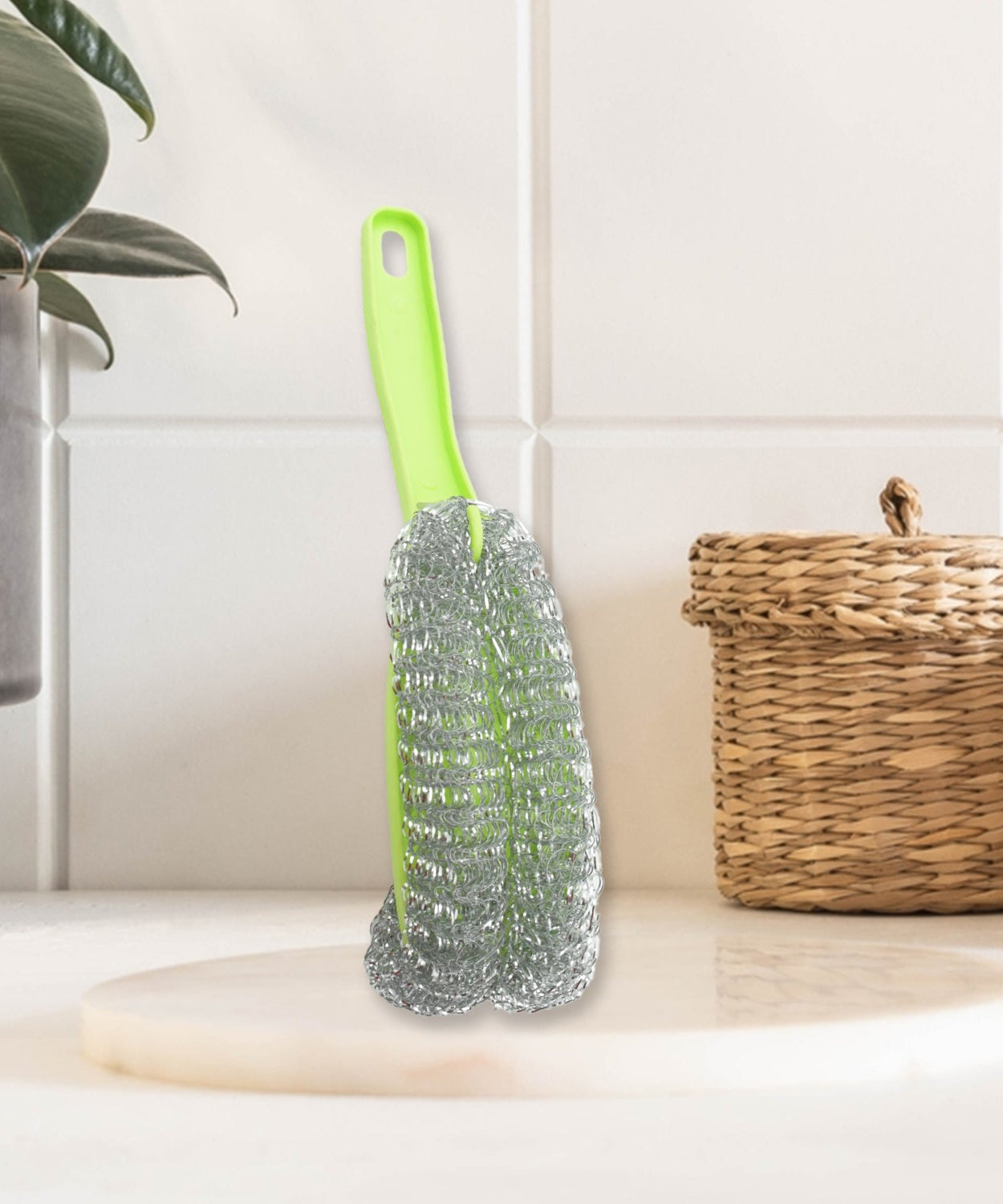 Multi-functional wire brush suitable for various kitchen cleaning tasks.