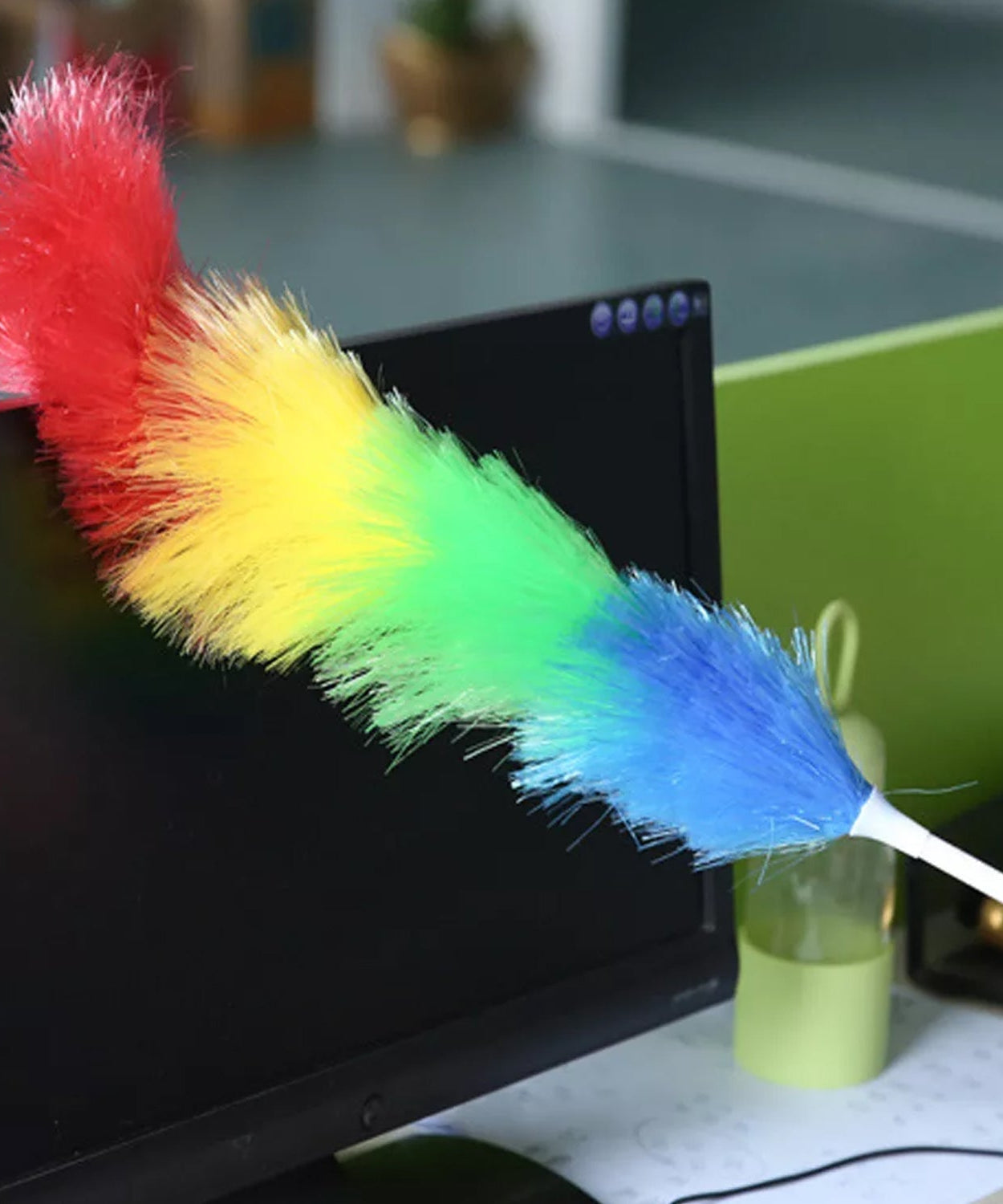 Microfiber dusting stick with colorful feathers