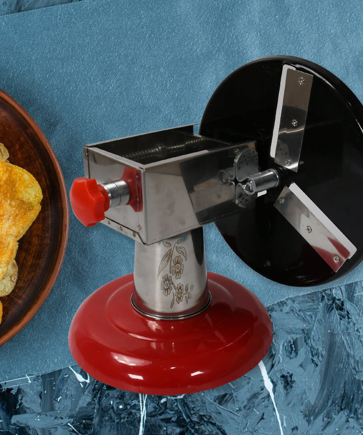 Stainless Steel Chips Maker and Vegetable Slicer for Kitchen Potato Slicer Graters and Chippers. Chips Maker is Suitable for Vegetable Cuttings. Chips Maker Consist Hard Coated Iron Wheel and Stand.