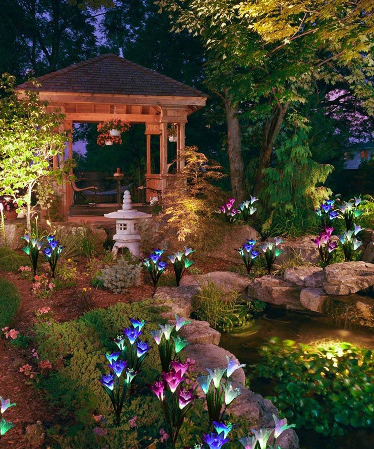 Solar lily lights, outdoor stake, glowing brightly
