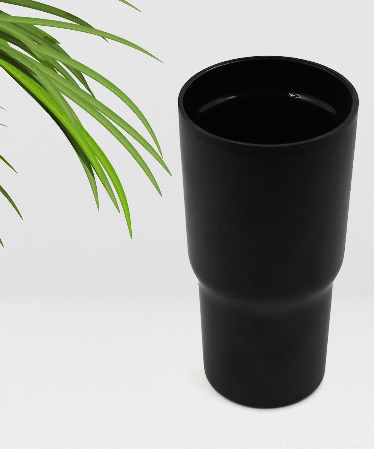 Leak-proof travel coffee mug with vacuum insulation for temperature retention.