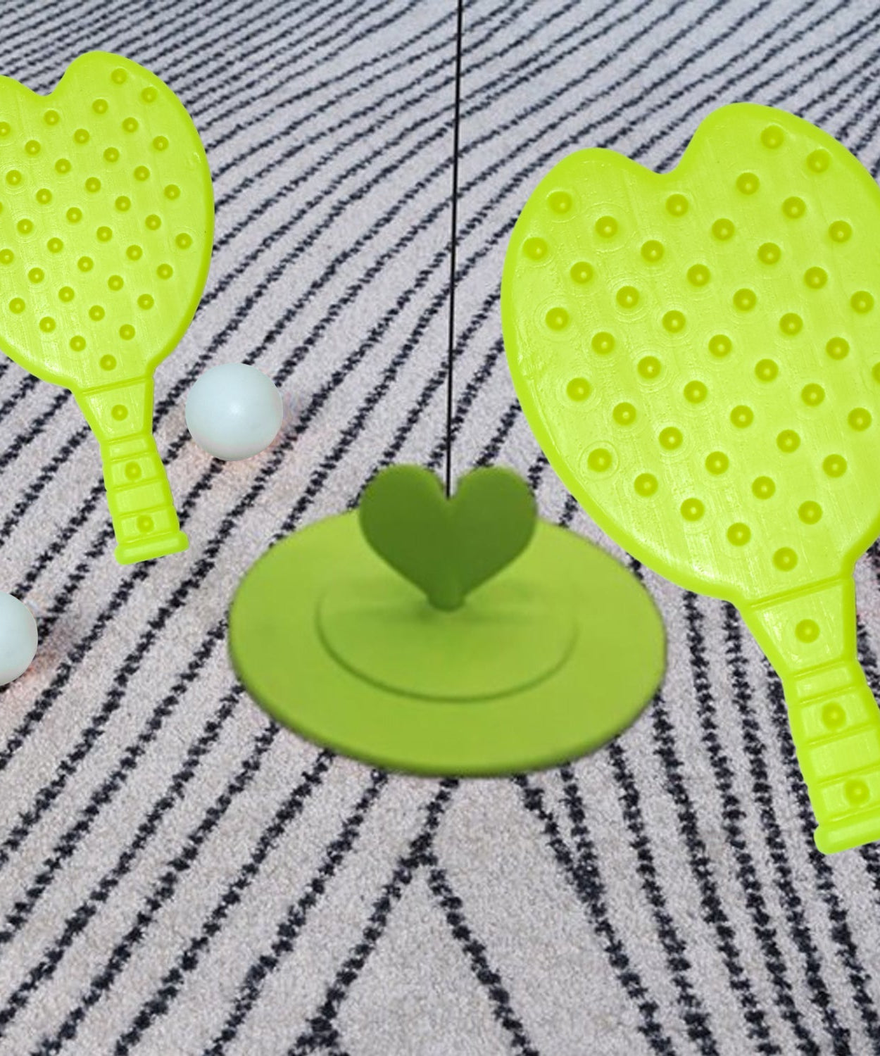 Table tennis racquet and ball set with vibrant colors and kid-friendly design