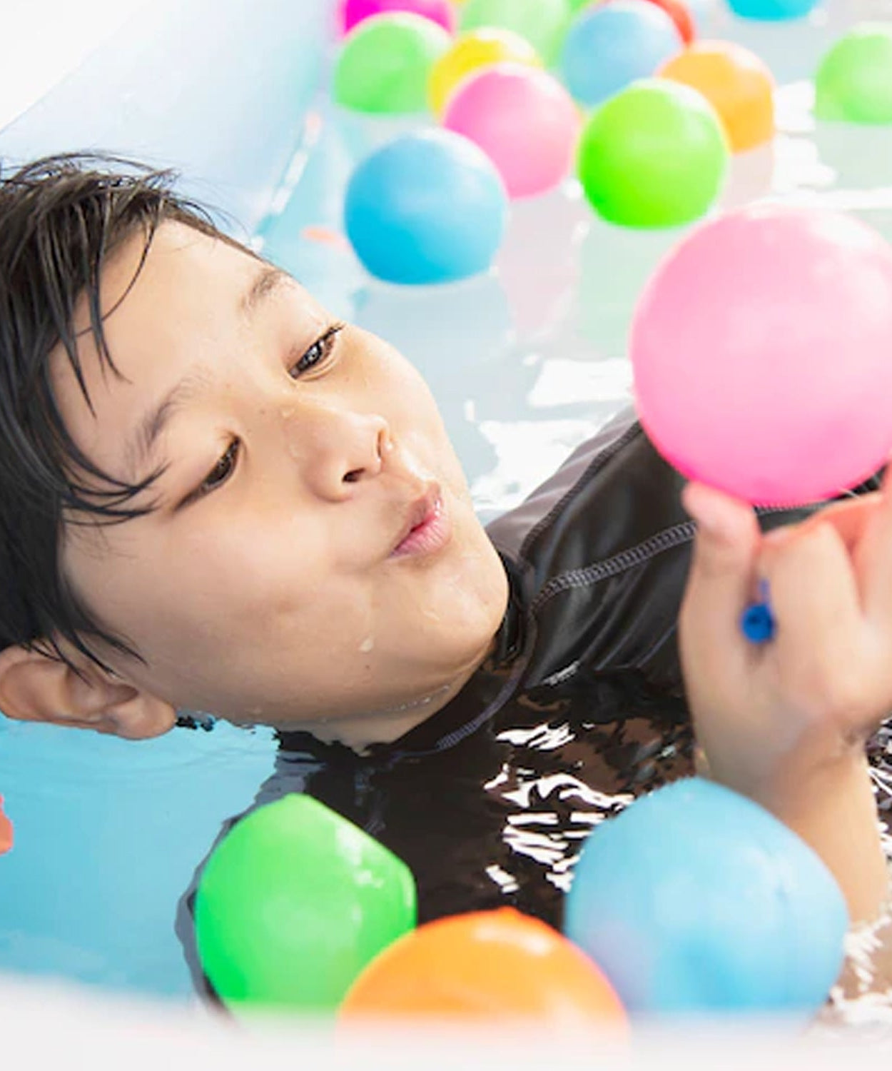 Assorted multicolour balls for indoor and outdoor play.