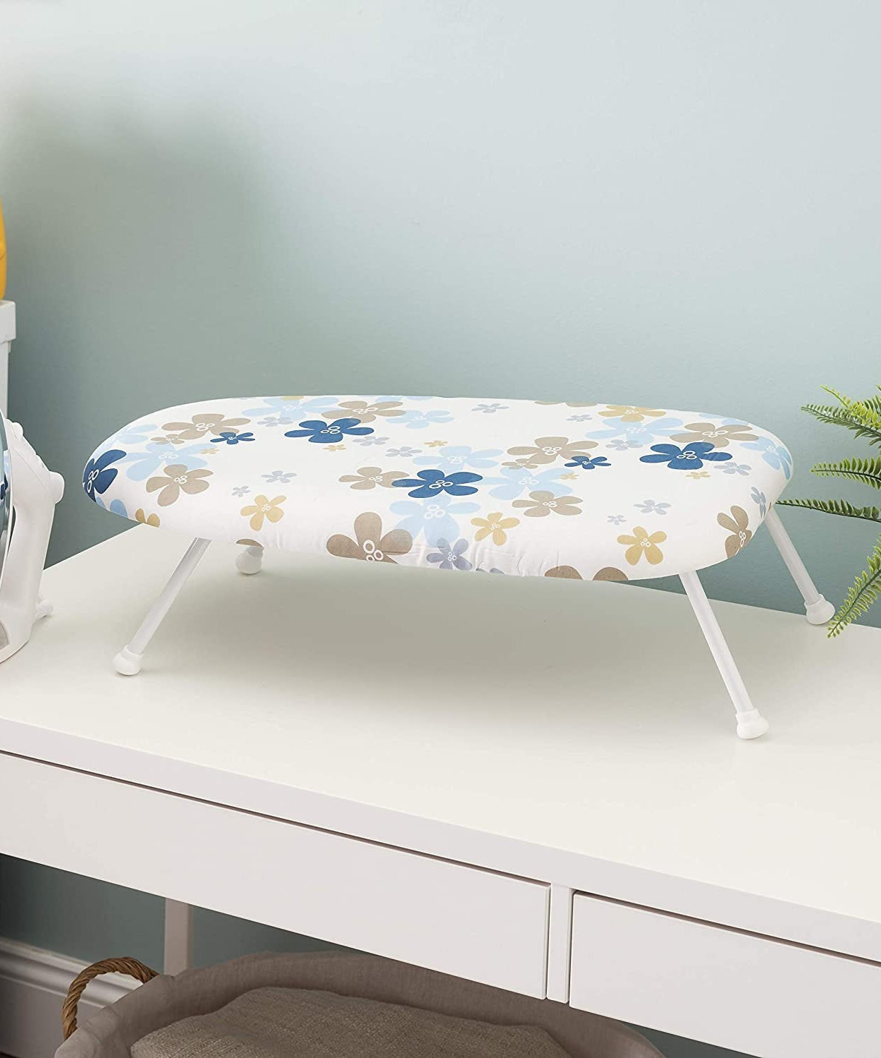 Portable ironing pad for easy clothes ironing at home or in shops.