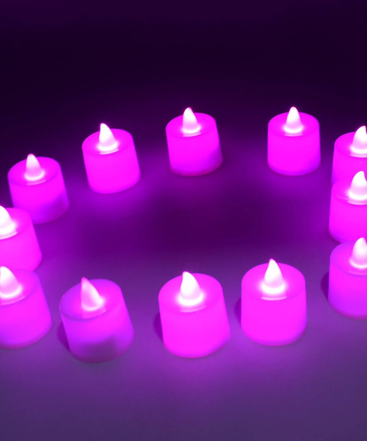 Pink LED tealights in pack of 12 for home decor