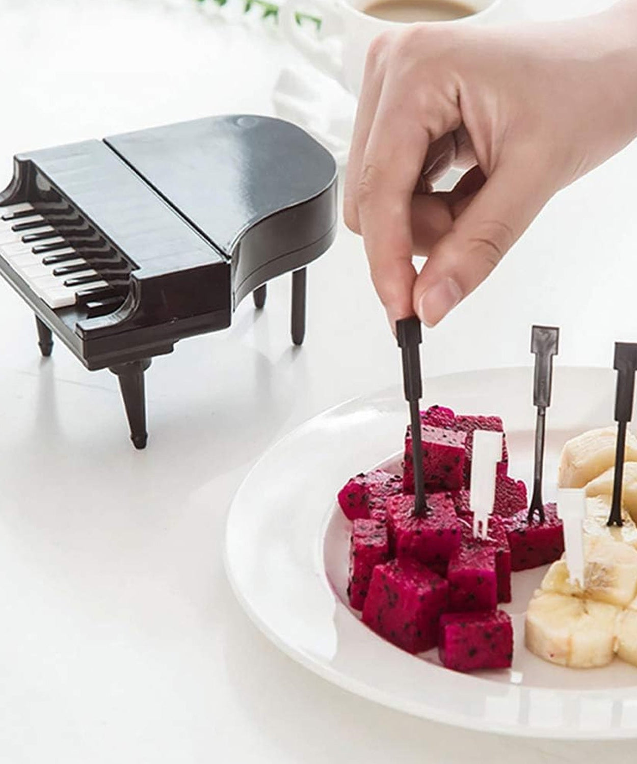 Fun piano-shaped fruit forks for snacks.
