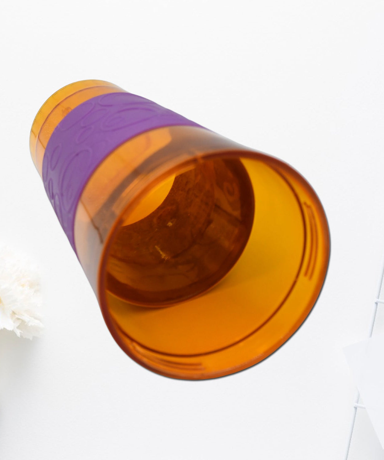 Convenient 2-in-1 cup and snack holder for travel, ideal for carrying snacks and drinks.