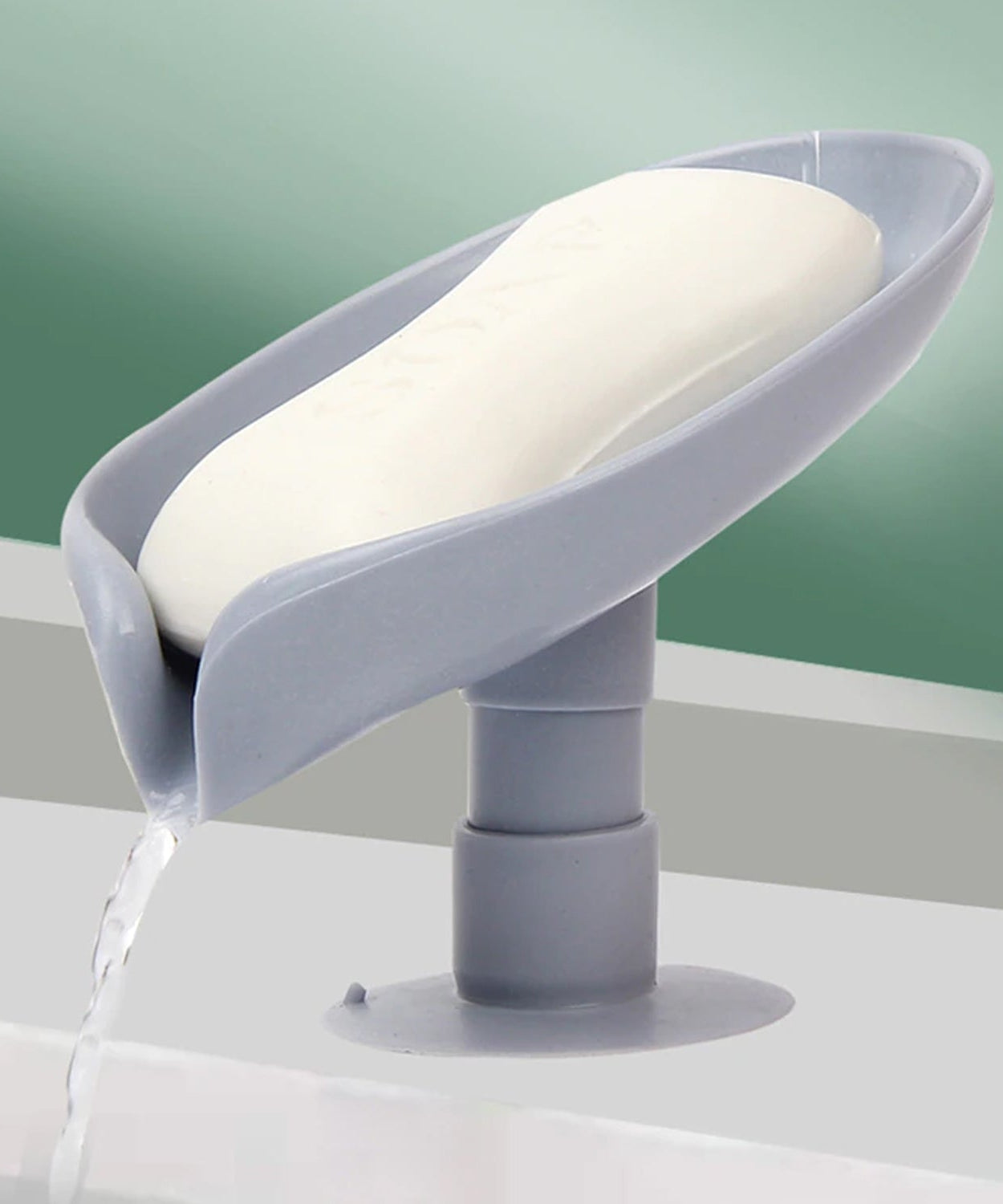 Self-draining leaf-shaped soap dish for kitchen or bathroom use.