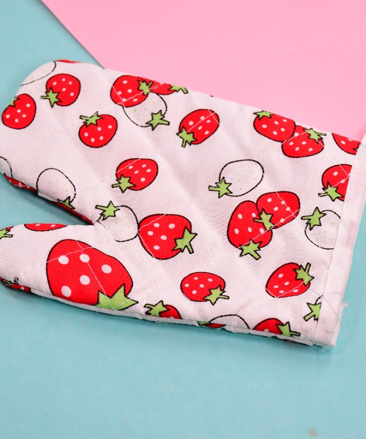 Vibrant designer oven mitt and pot holder for baking and cooking.