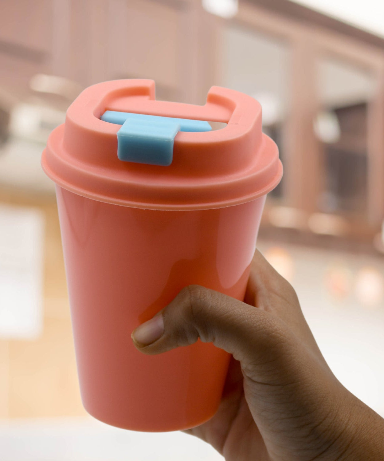 Portable plastic coffee cup, suitable for home, office, or travel, with a motivational design.