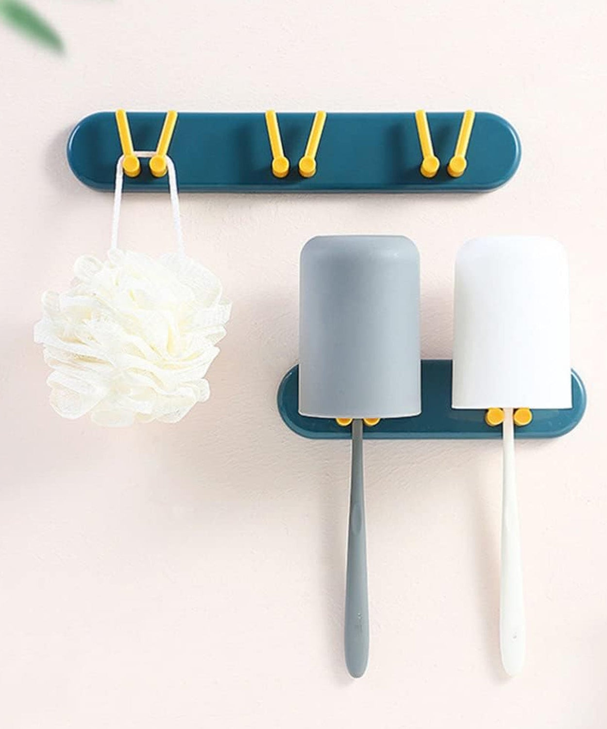 Bathroom shelf and hook organizer for toothbrushes and other essentials.