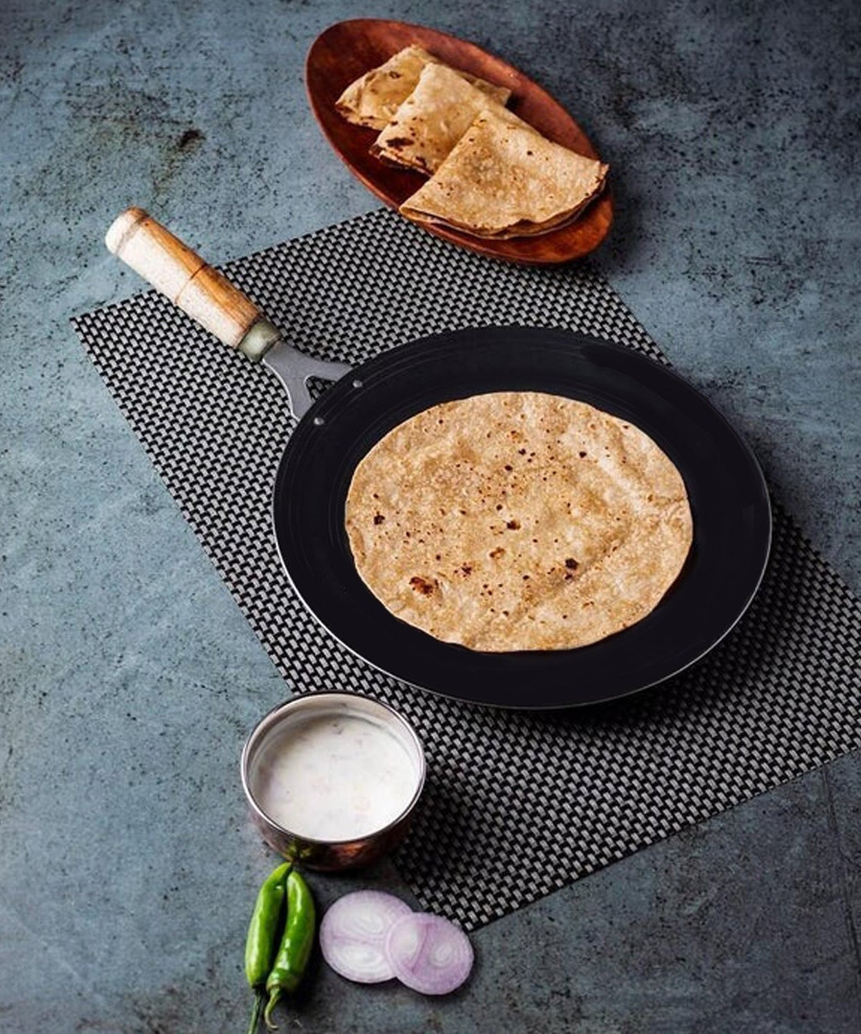 Nonstick wooden handle roti tawa, ideal for everyday cooking of rotis.