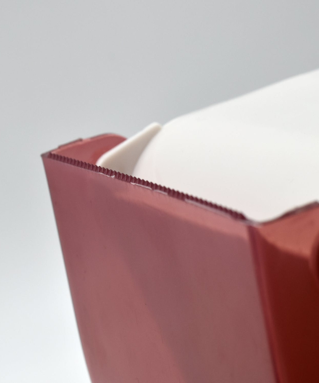 Tissue holder with a simple design for effective use in home settings