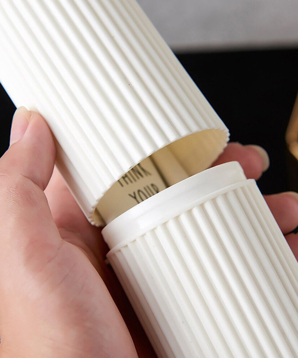 Close-up of capsule-shaped travel storage bottle