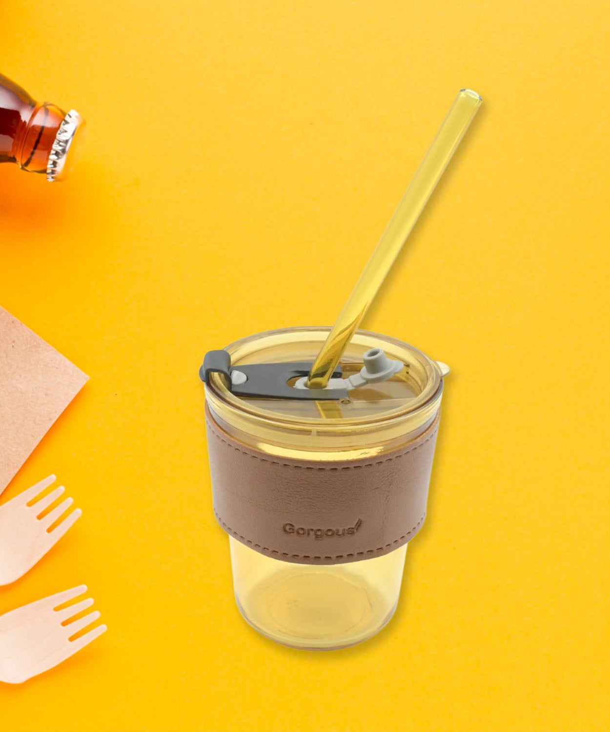 Glass coffee mug with straw and lid, perfect for travel