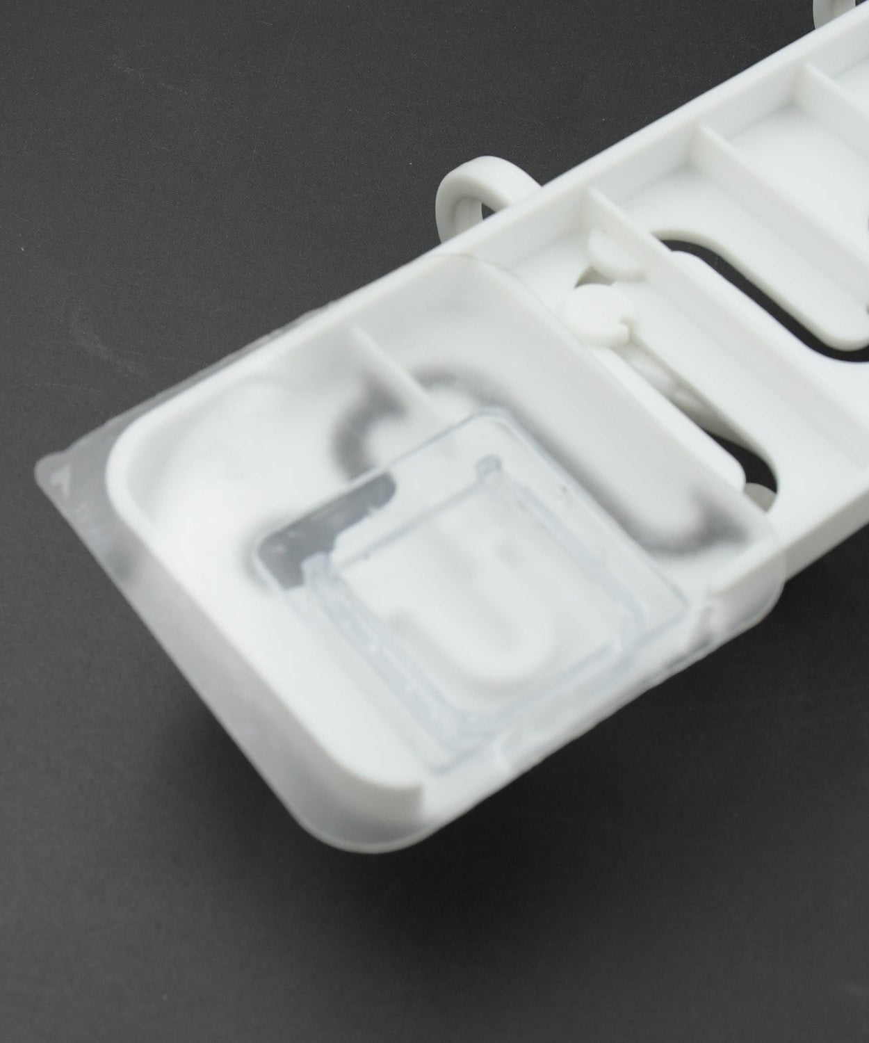 Wall-mounted hook, adjustable and slides for convenience