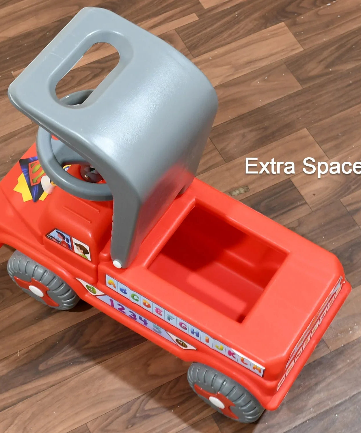 Musical ride-on toy car with backrest for children