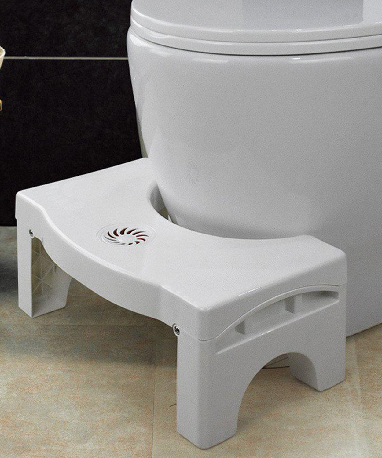 White non-slip toilet squat stool, easily foldable for convenience.