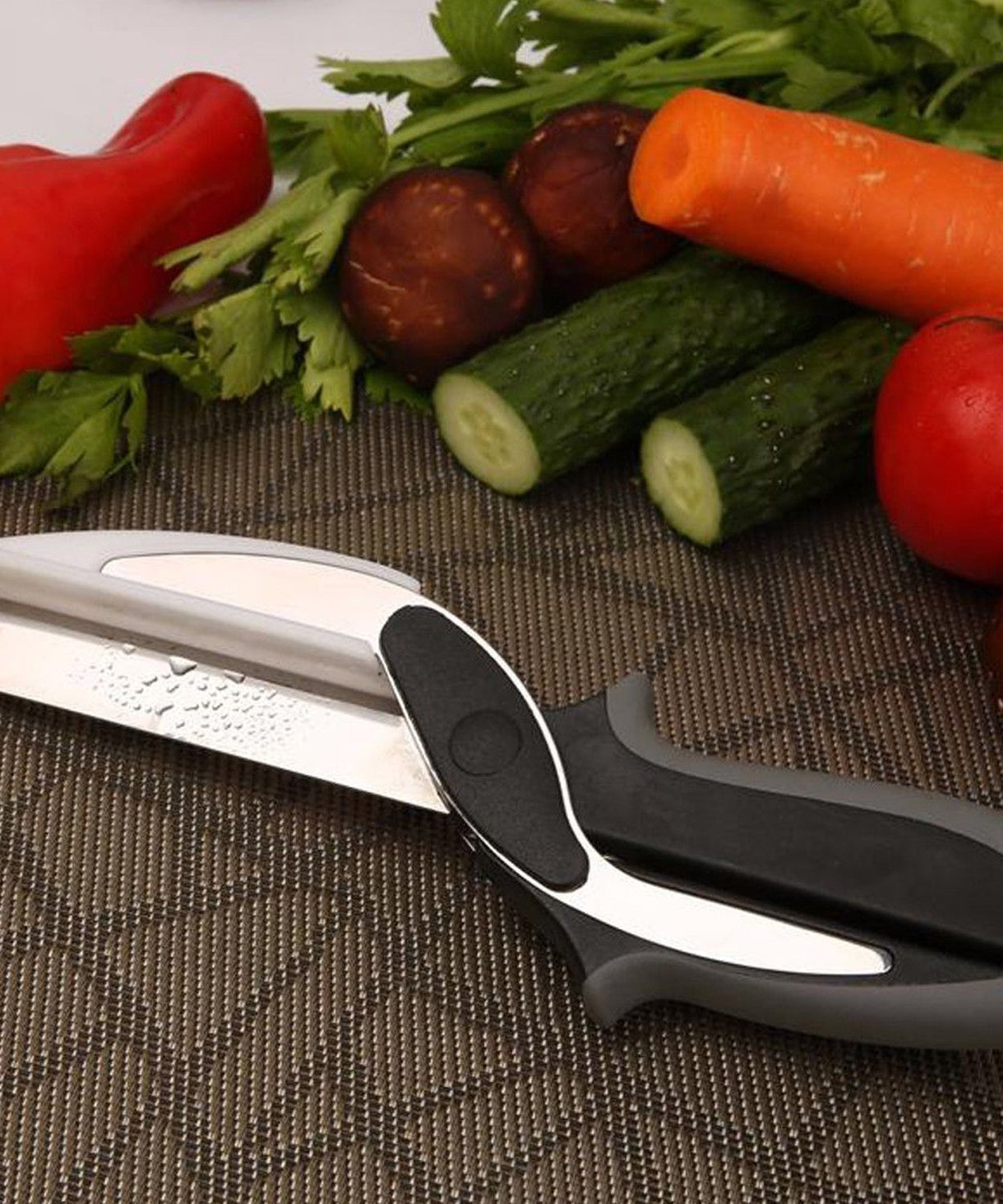 2-in-1 food chopper with handle for versatile cutting and dicing.