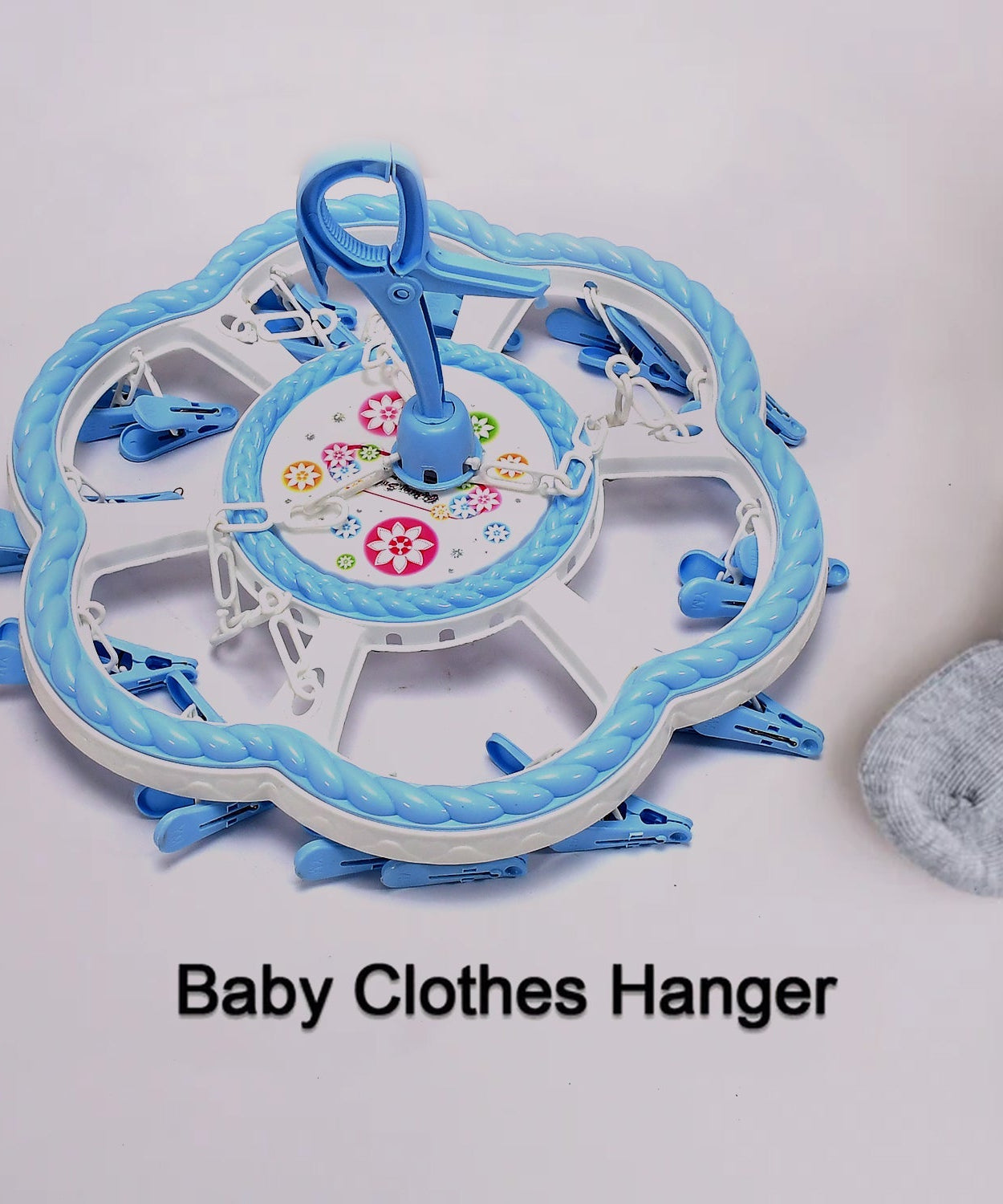 Flower hanger with multiple clips