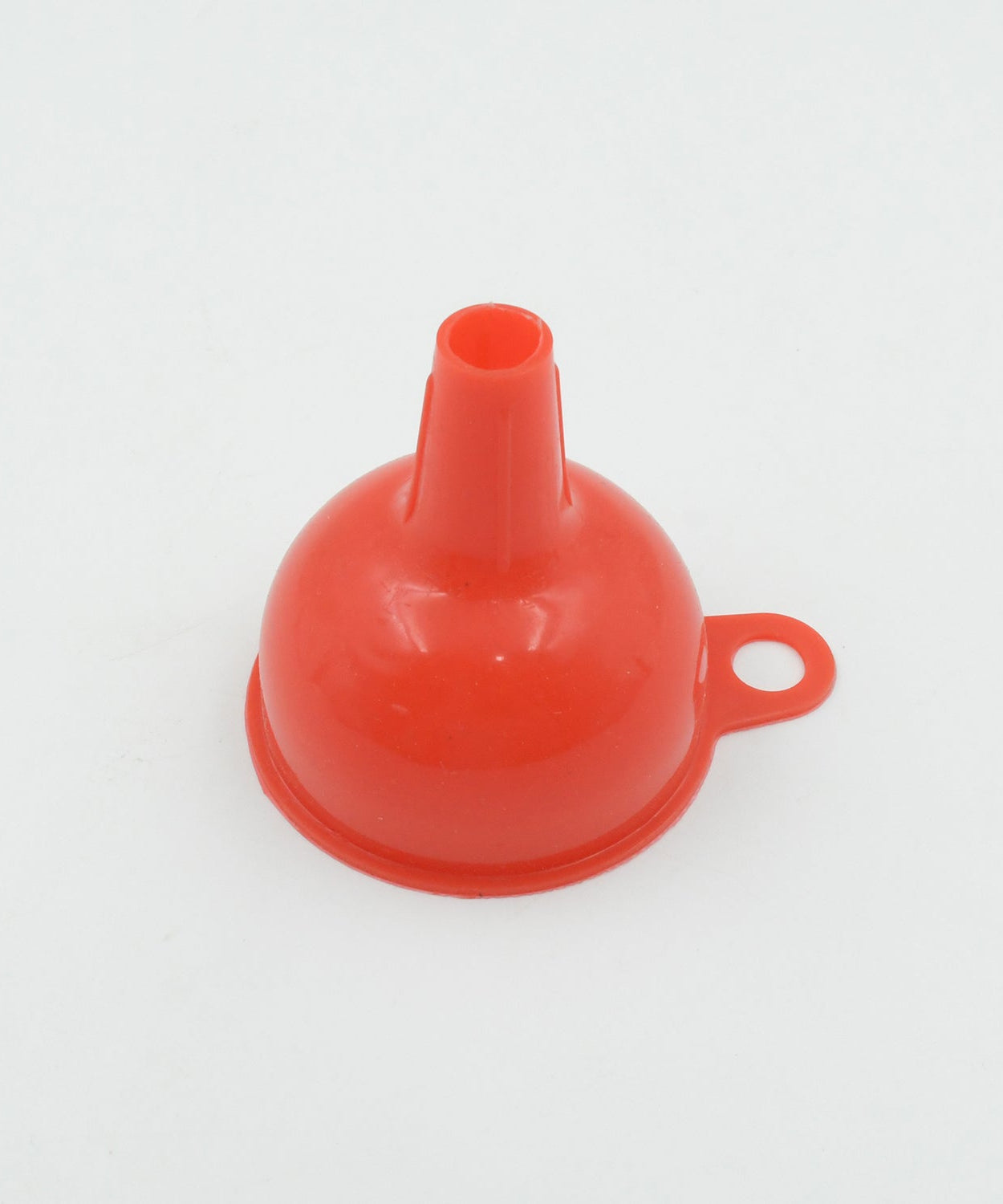 Silicone funnel in use for pouring liquids and grains