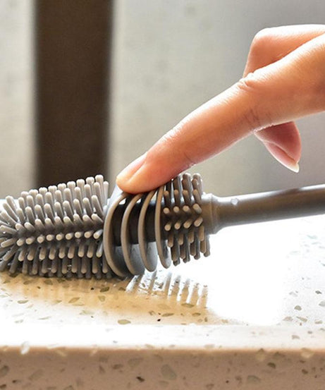 Long handled brush for cleaning narrow neck containers