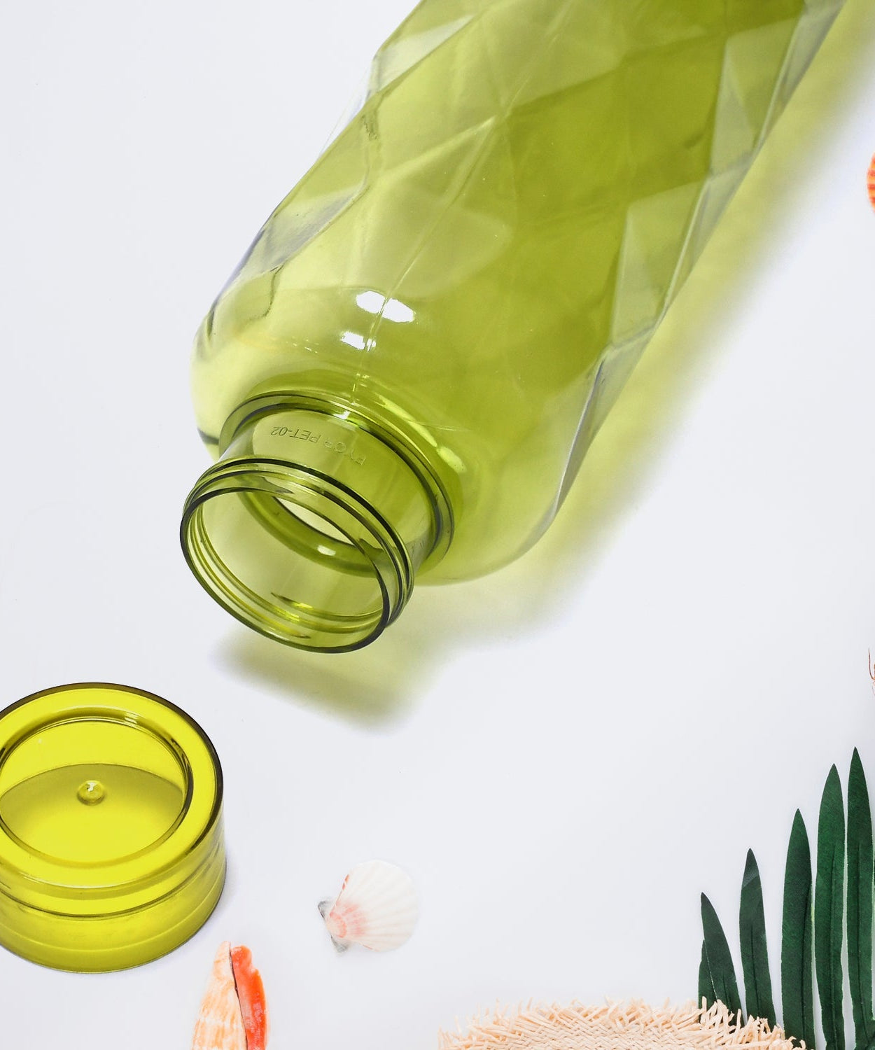 Set of diamond-cut bottles designed for storing and serving beverages.