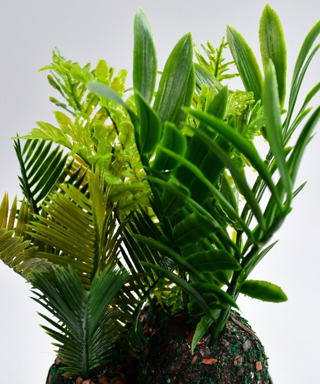 Close-up of artificial plant in decorative pot