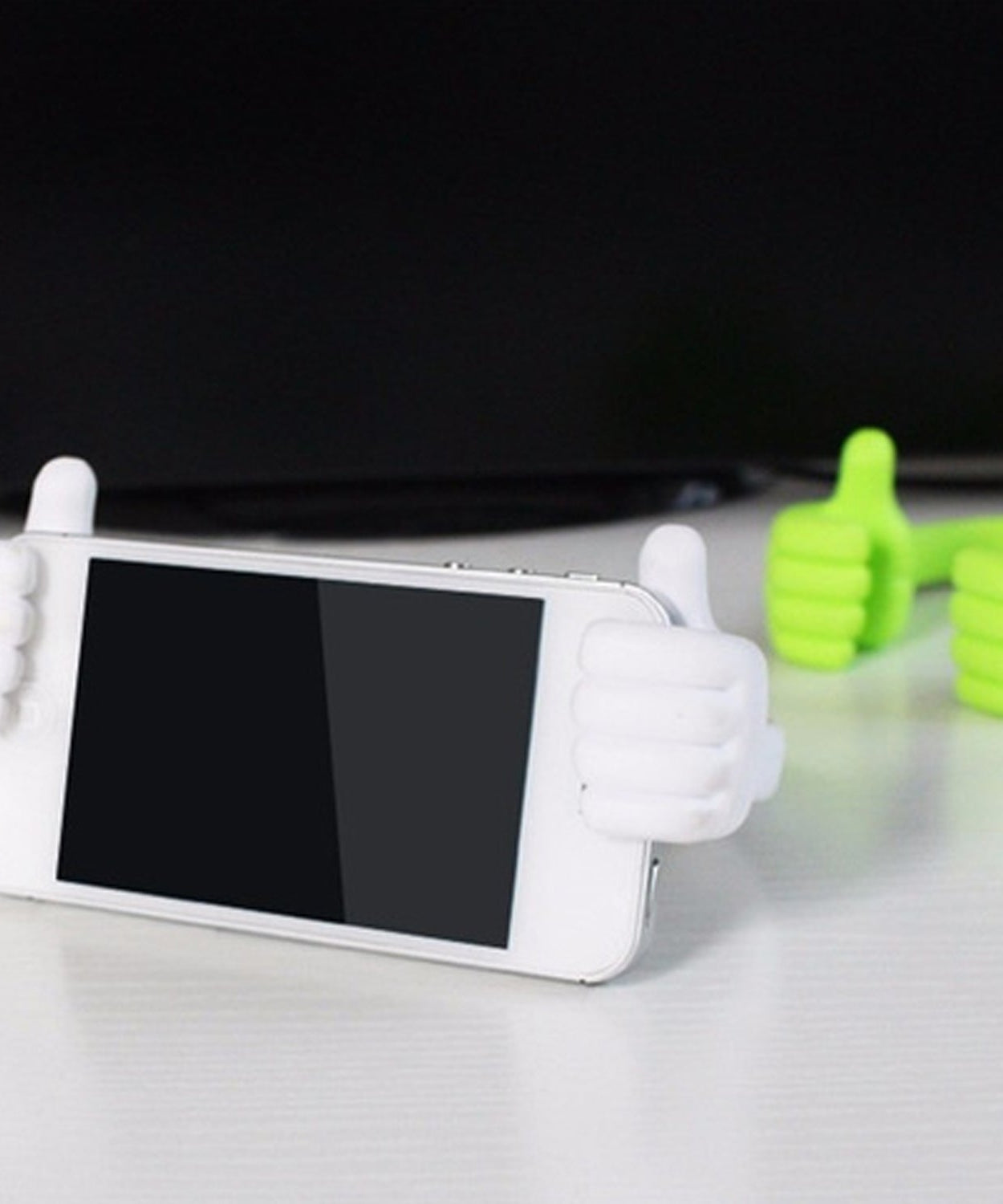 Hand design mobile stand for providing stable phone support.