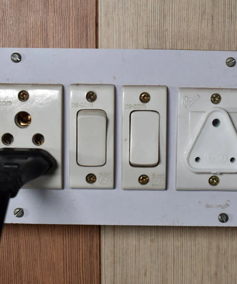 Large electric socket safety covers in various positions