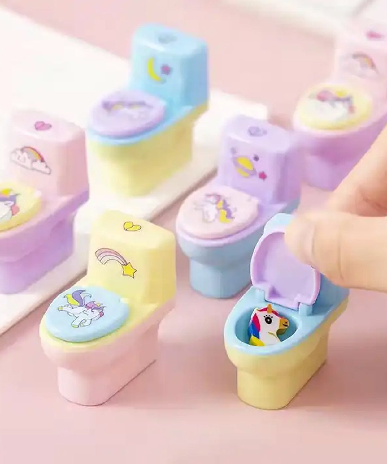 Fun pencil sharpener in toilet shape, includes eraser