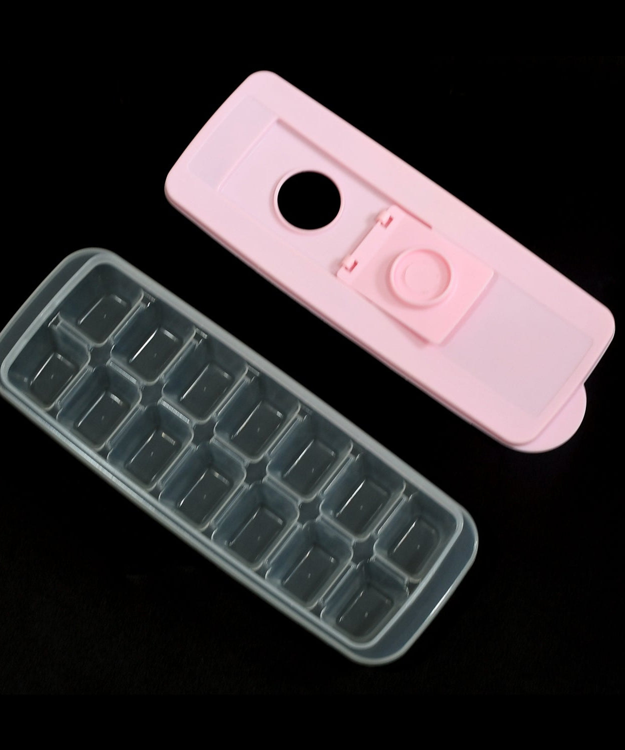 Food-grade silicone ice cube tray with lids, flexible for easy release, makes 14 ice cubes.