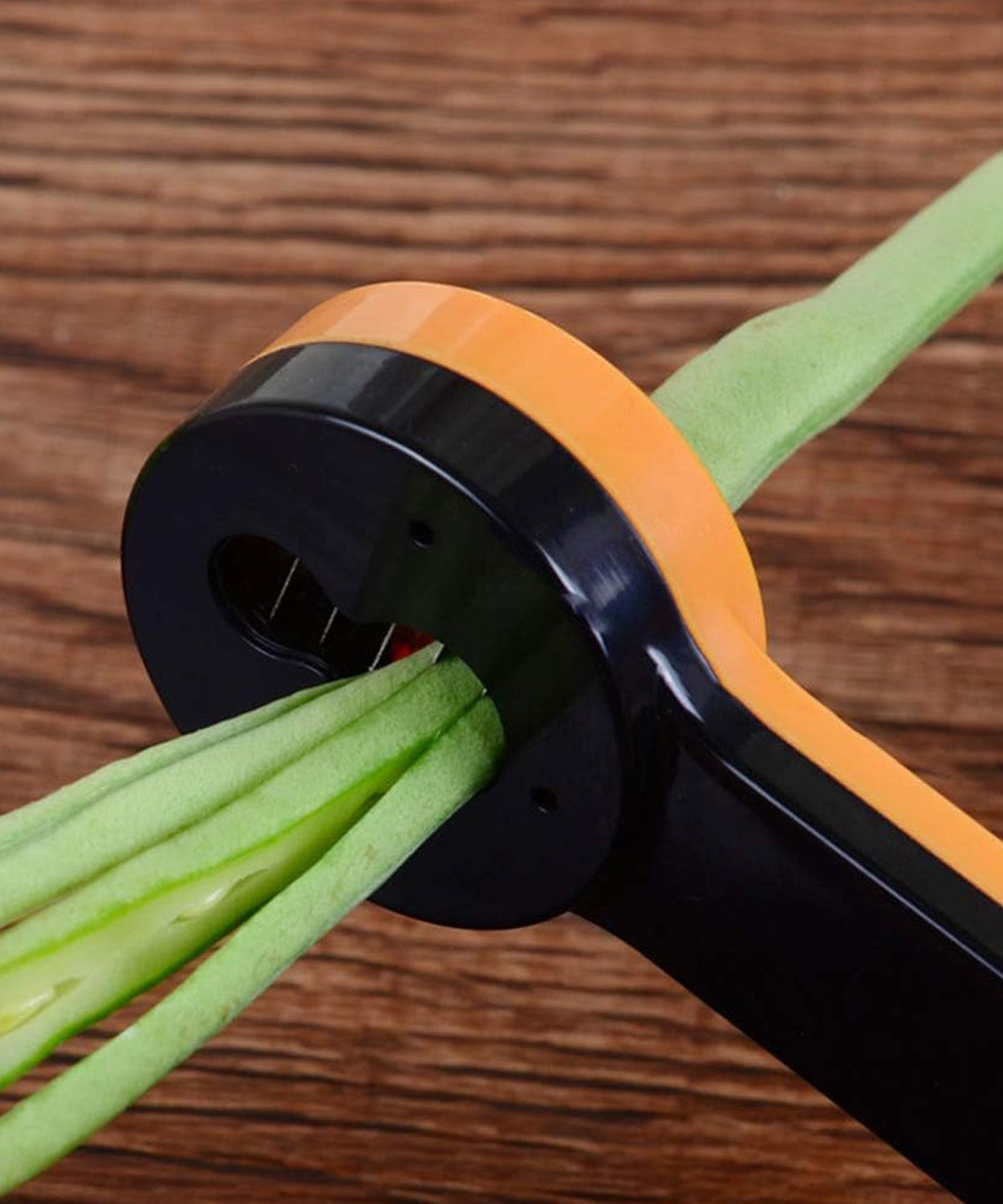 Handy green bean slicer for quick and easy vegetable preparation.