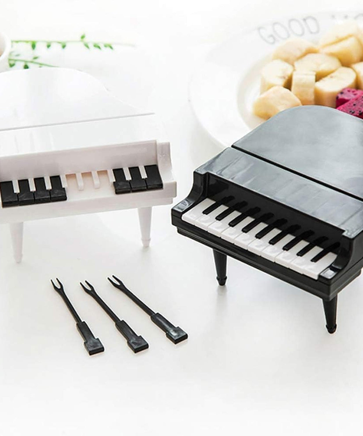 Piano-shaped snack forks for kids and adults.