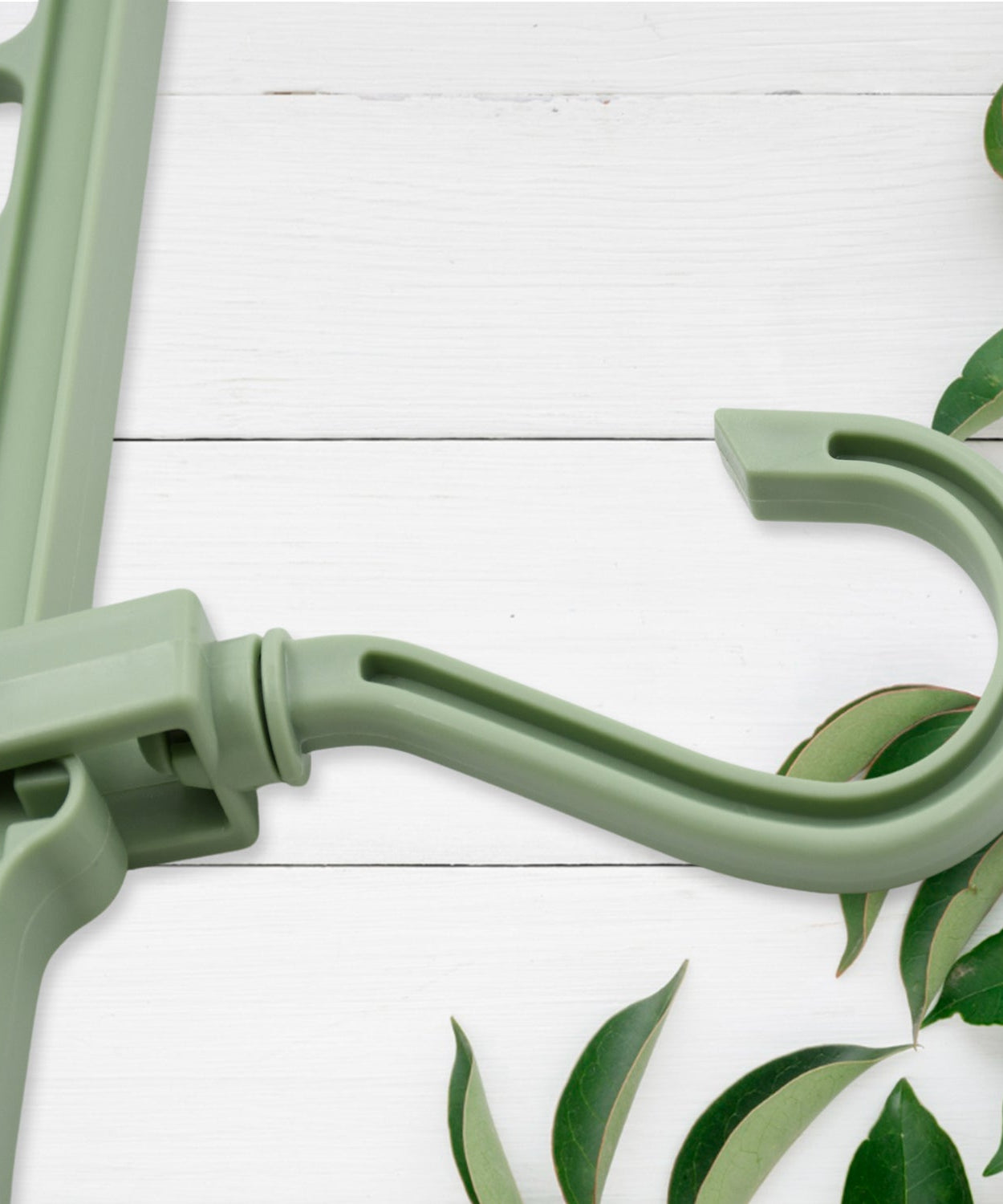 Indoor plastic hanger hooks, ideal for clothes organization.