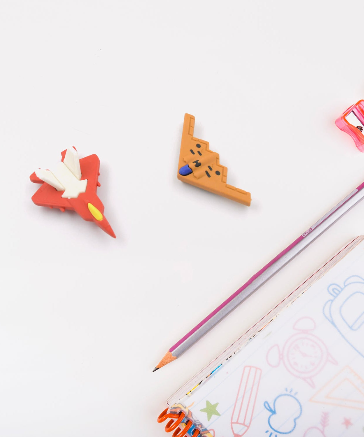 Pack of fun erasers in gun and plane shapes for kids