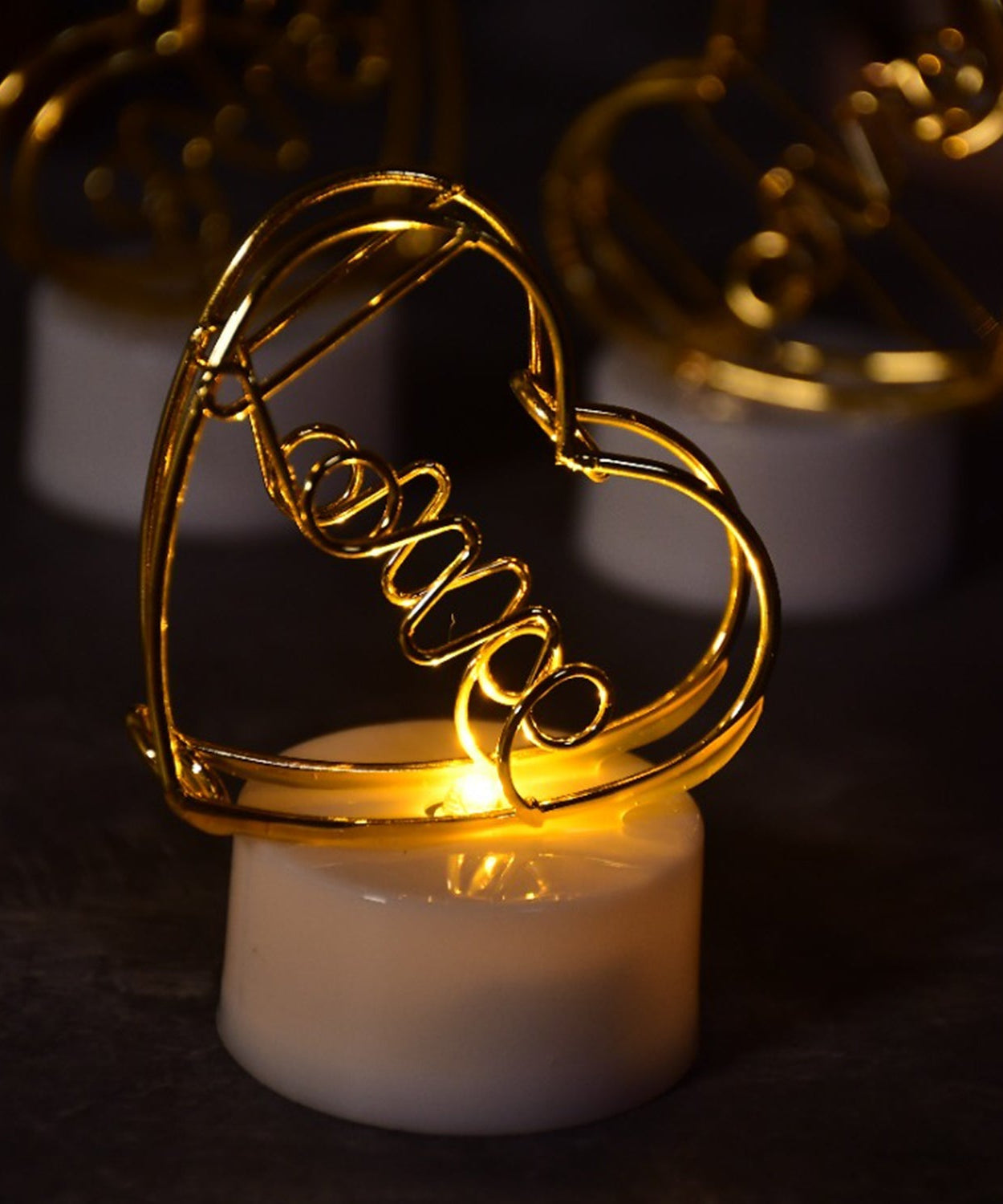 Multicolor flameless heart candles for decor.