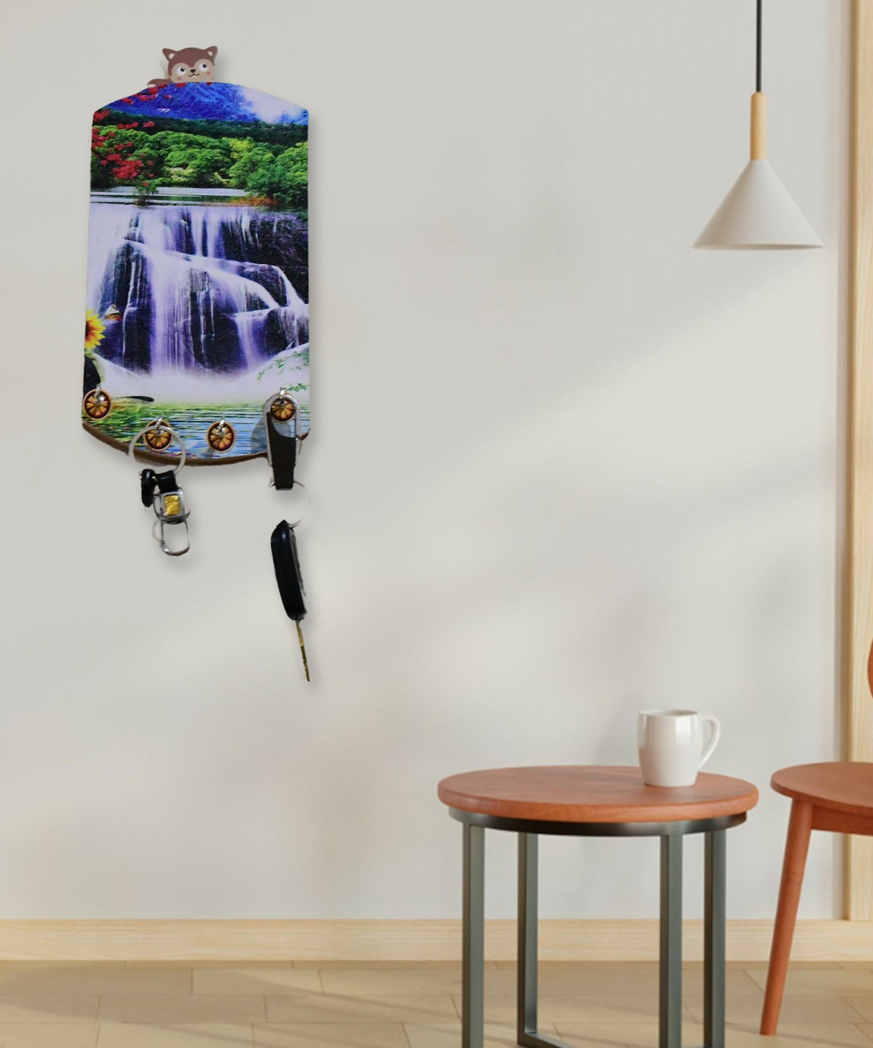 Wooden wall decor with scenic vertical design and hanging hooks.